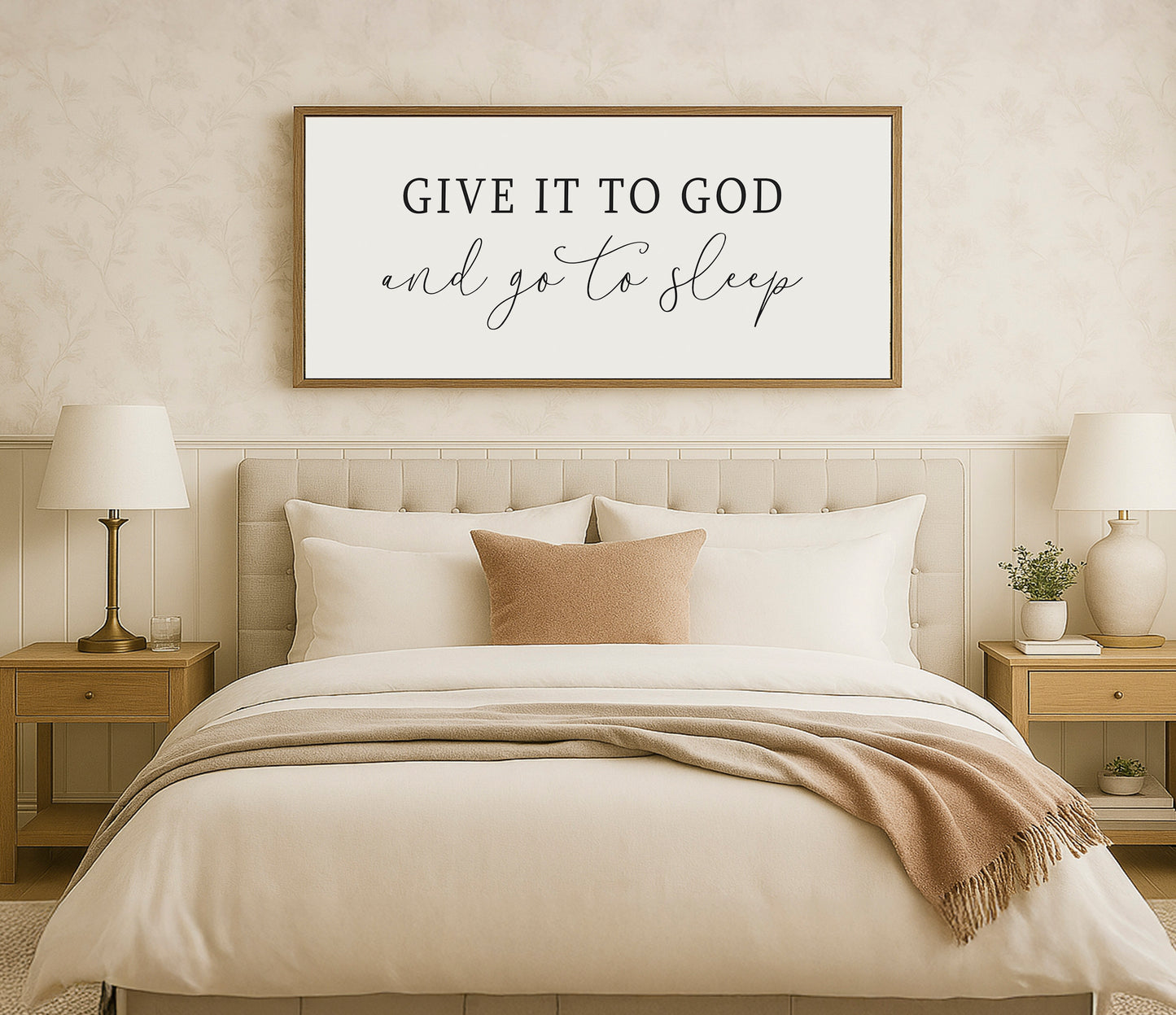 a bedroom with a bed, nightstands and a framed poster