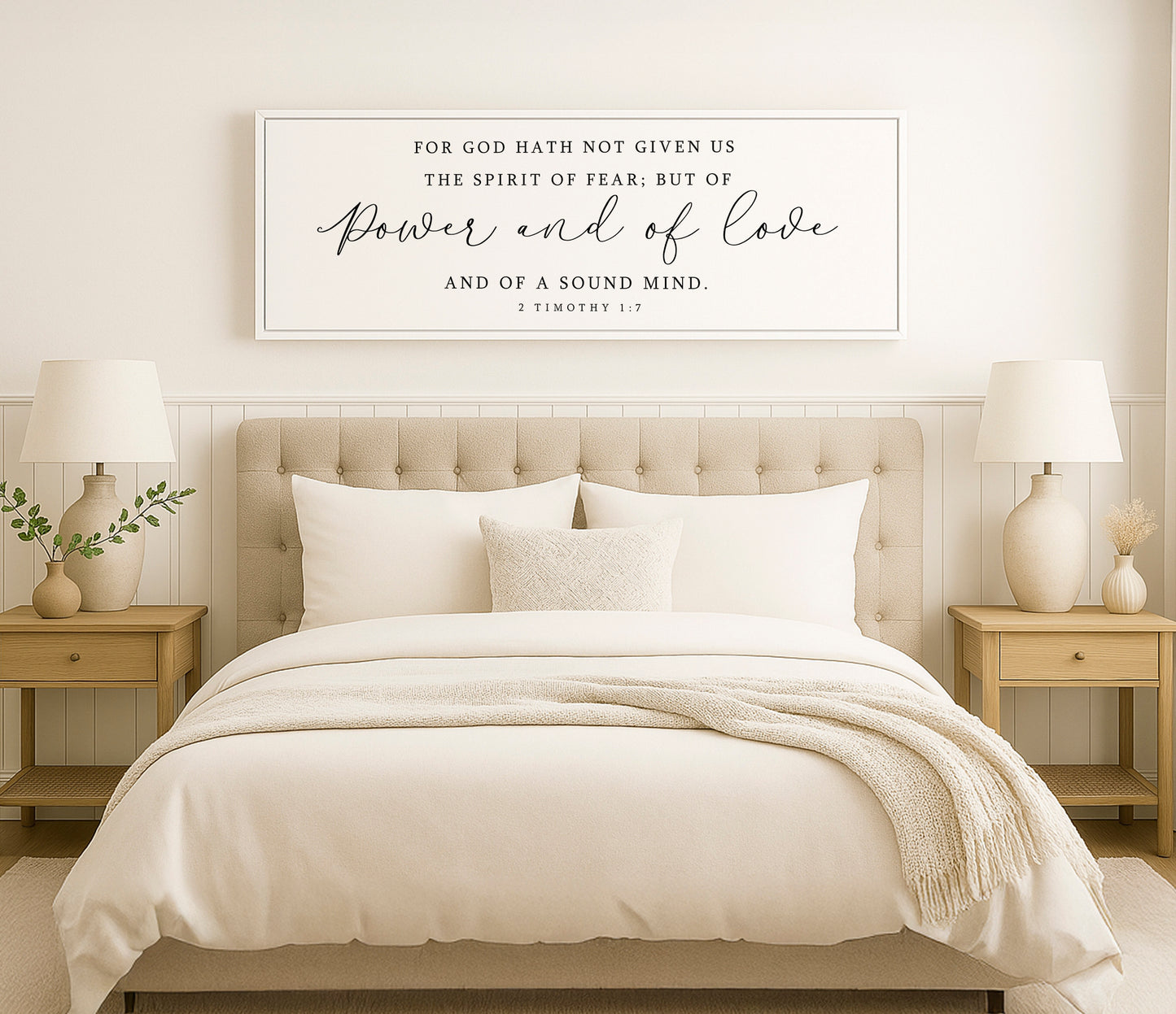 a bed with a white comforter and pillows