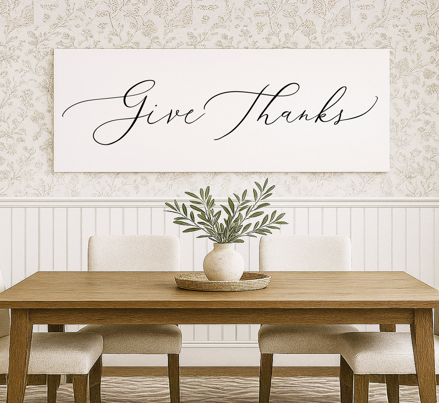 a dining room table with a vase of flowers on it