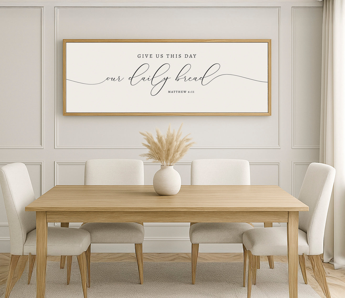 a dining room table with a vase of flowers on it