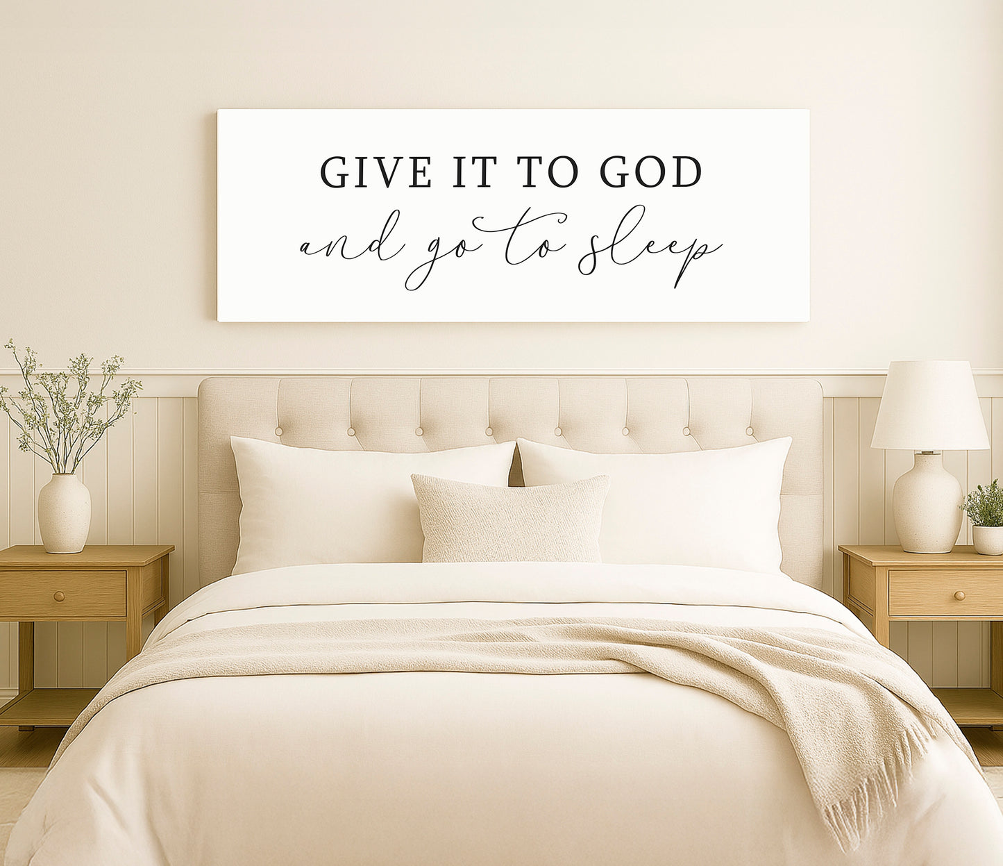 a bed with a white comforter and pillows