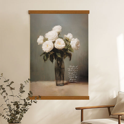 a painting of a vase filled with white roses hanging on a wall.