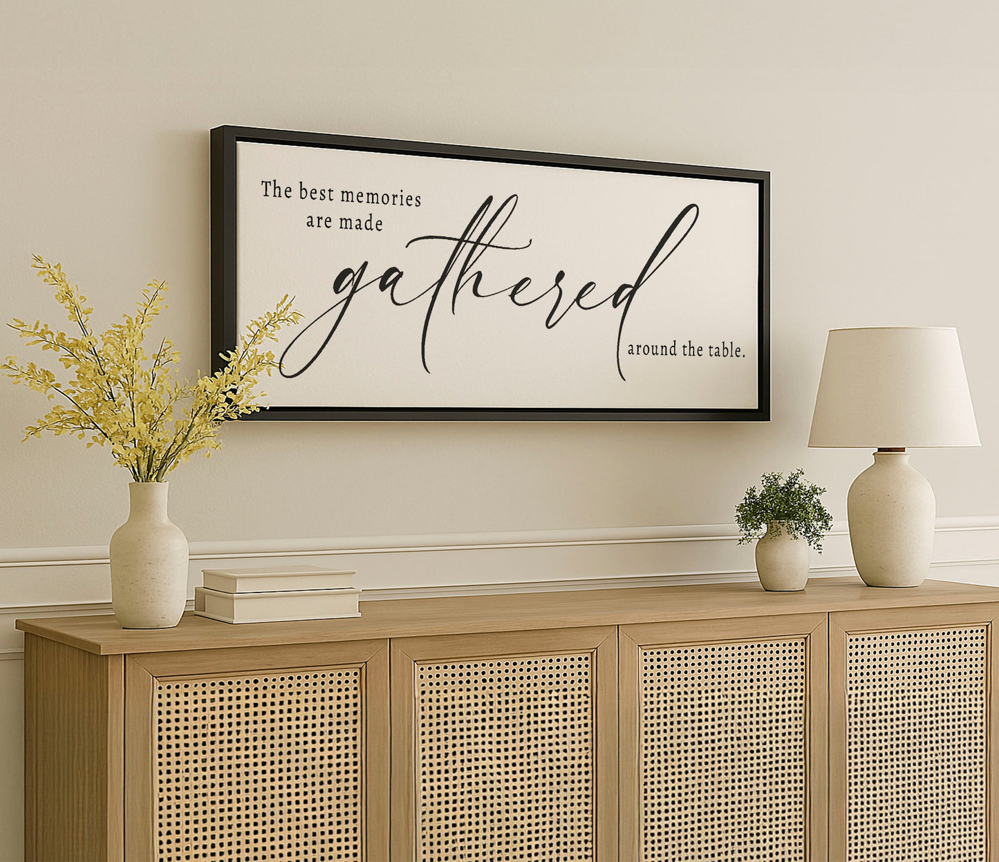 a picture hanging on a wall above a dresser