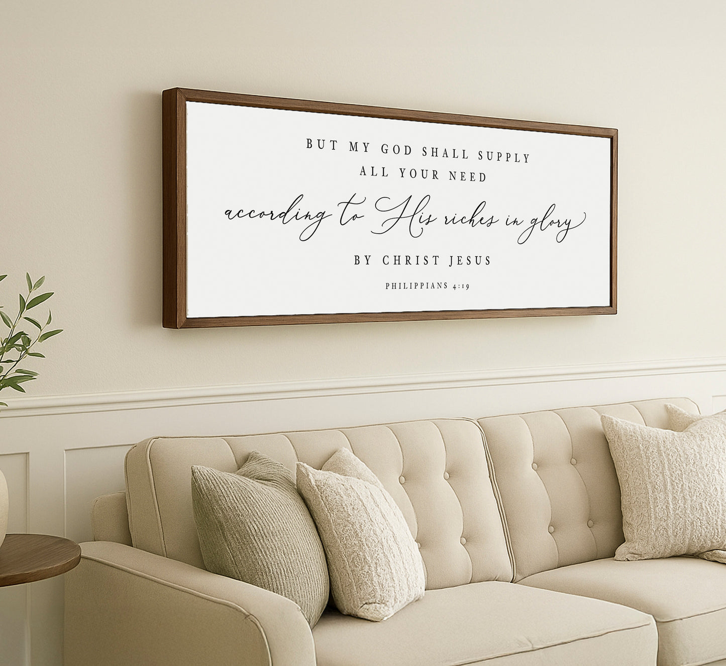 a living room with a couch and a framed picture