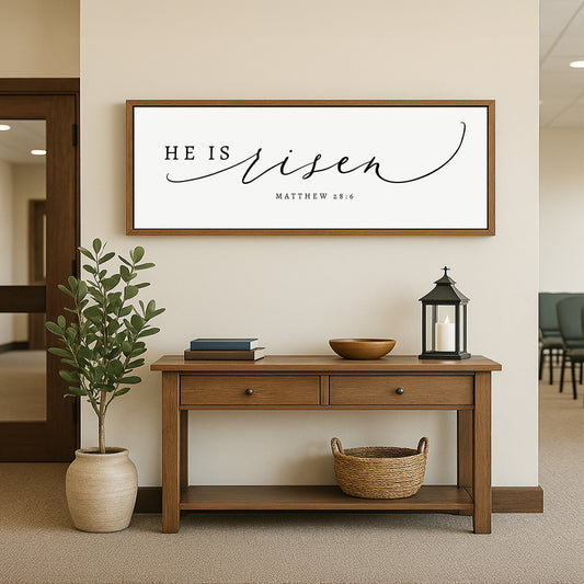 a wooden table with a vase and a potted plant on top of it