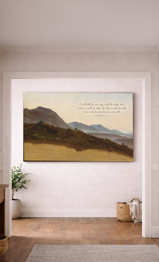 a large landscape painting hanging on a white wall in a room with a wooden floor.