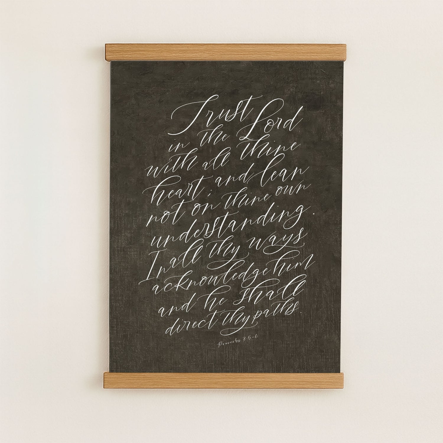 The image is a blackboard with white handwritten text that reads "Trust in the Lord with all of your heart, and lean not on them, but on the Lord."