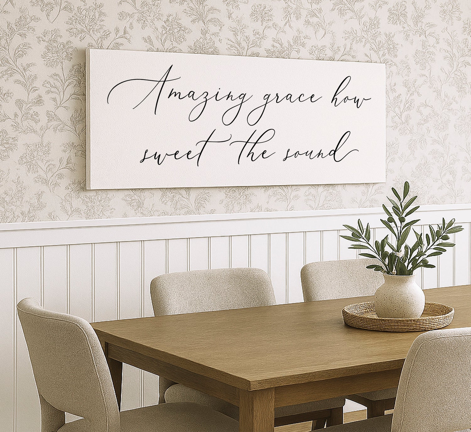 a dining room table with a vase of flowers on it