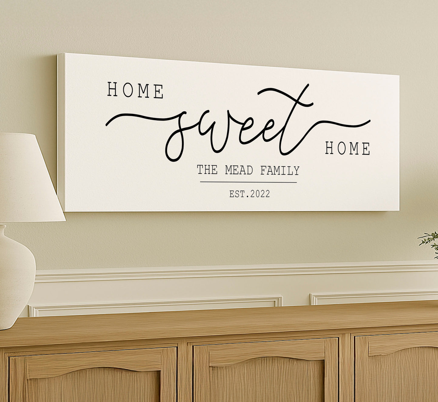 a sign that says home sweet the mead family