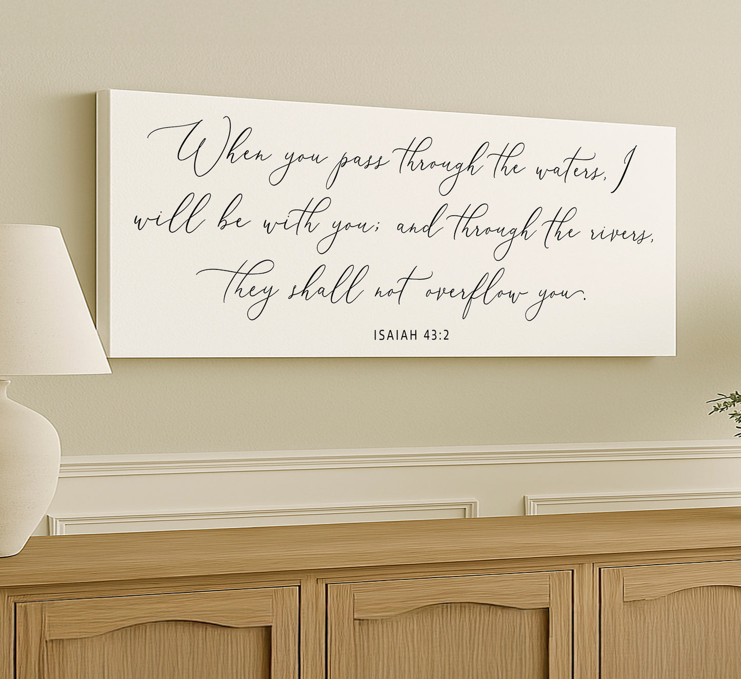 a white canvas with a bible verse on it