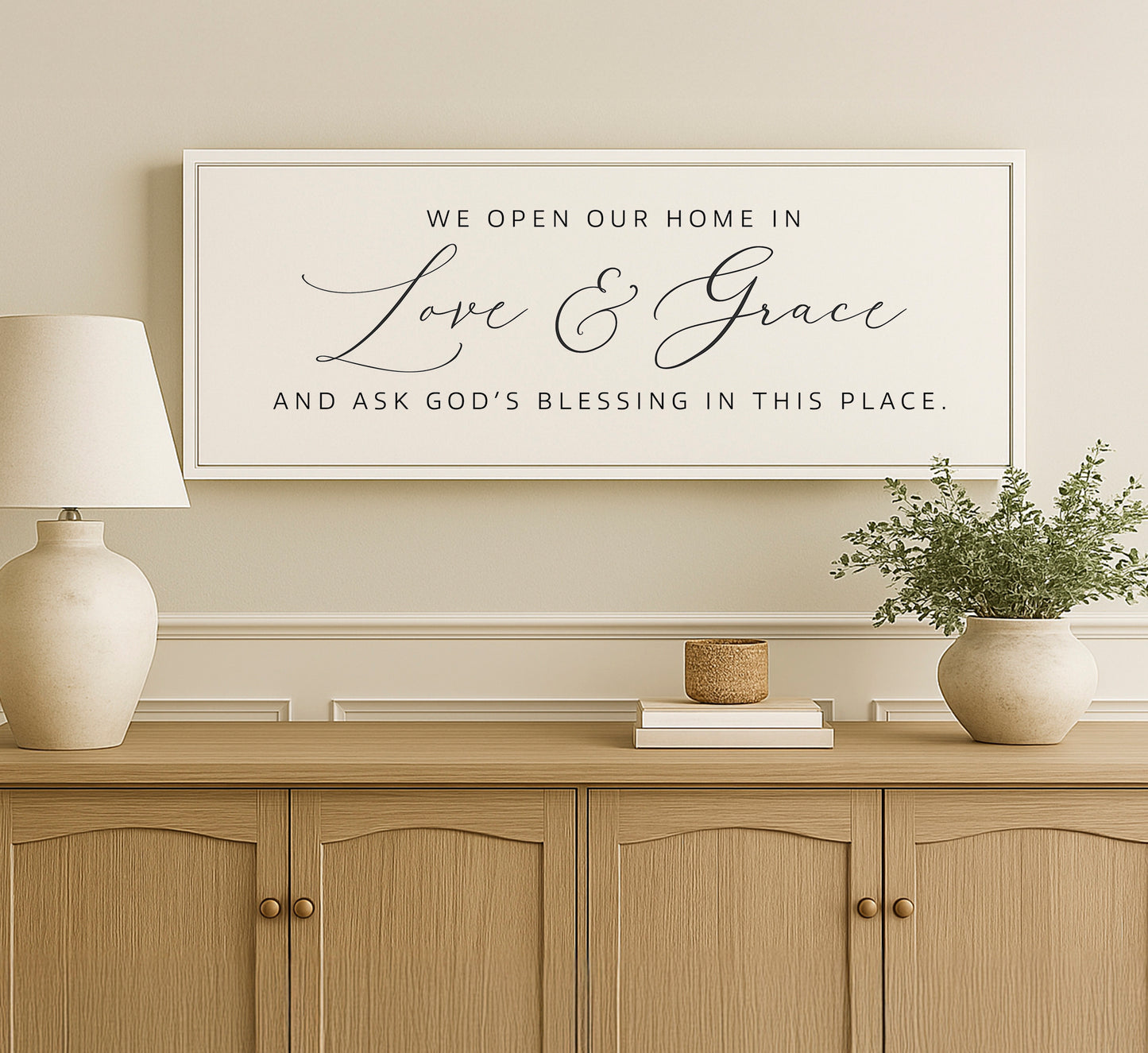 a white framed sign on a wall above a dresser