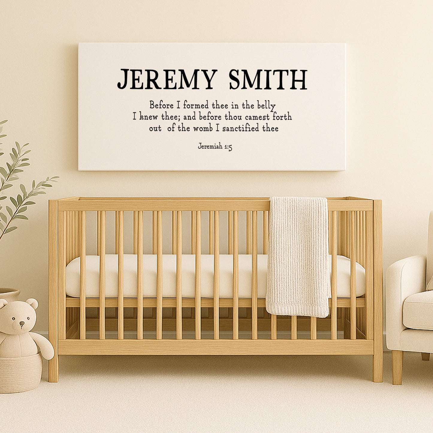 a baby crib with a teddy bear next to it