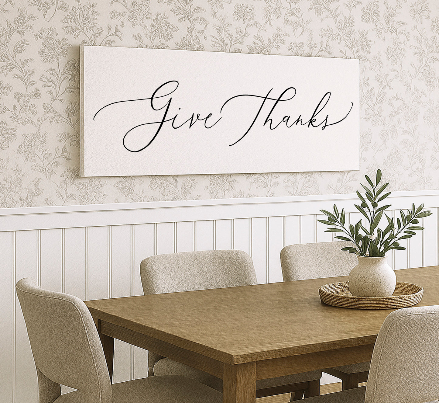 a dining room table with a vase of flowers on it