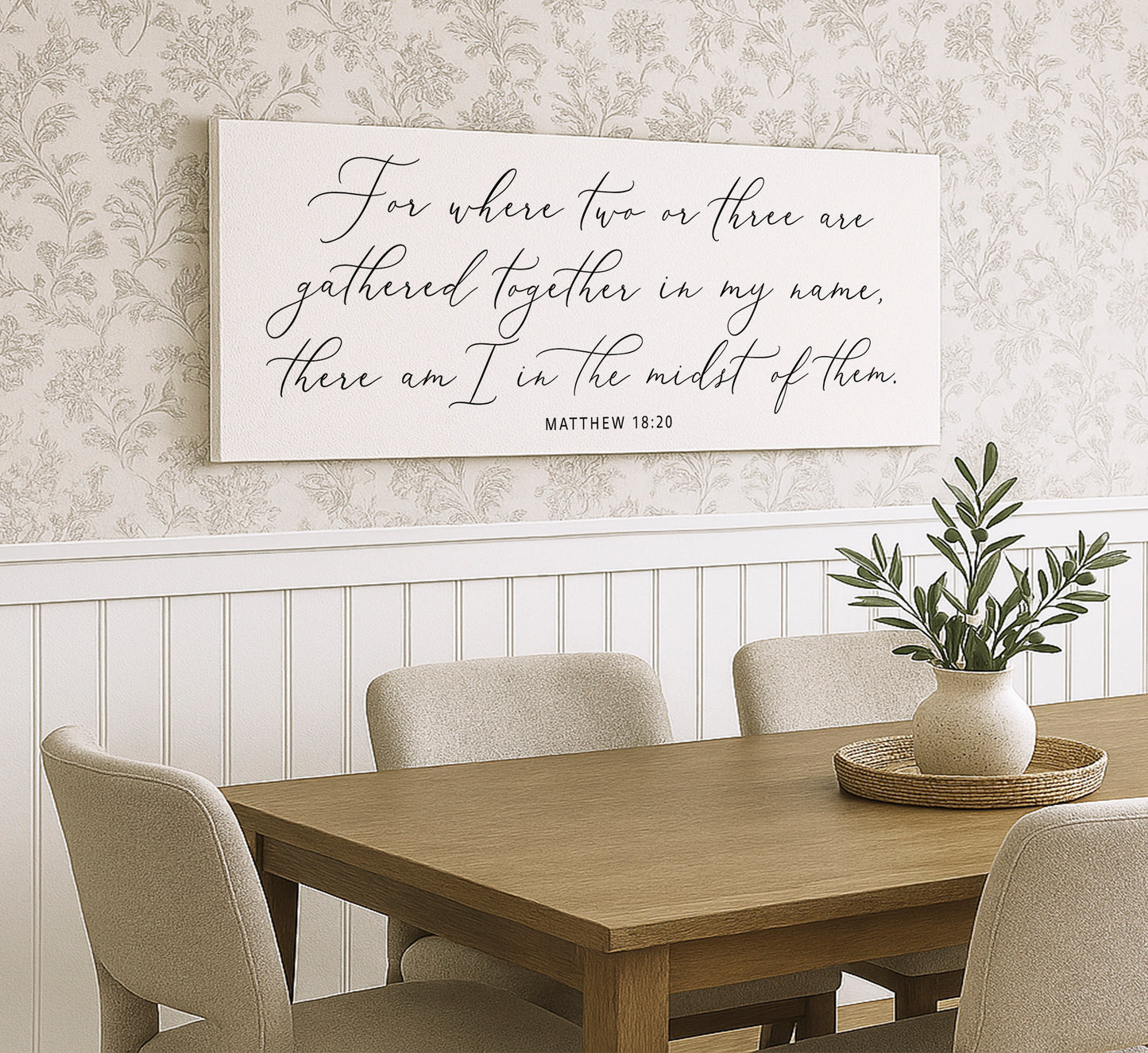 a dining room table with a vase of flowers on it