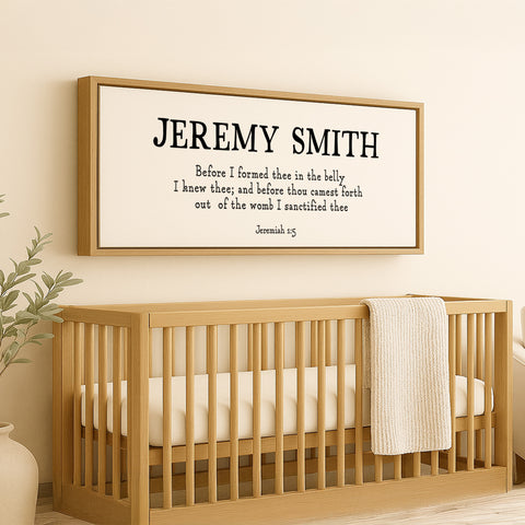 a wooden crib with a white blanket on top of it