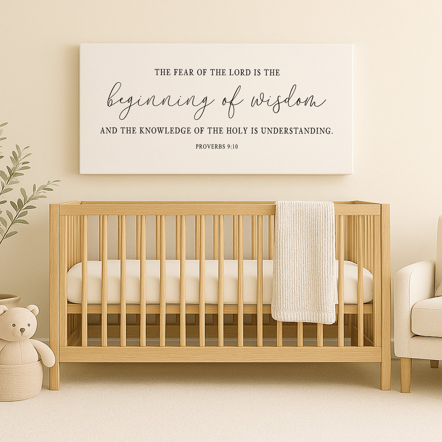a baby crib with a teddy bear next to it