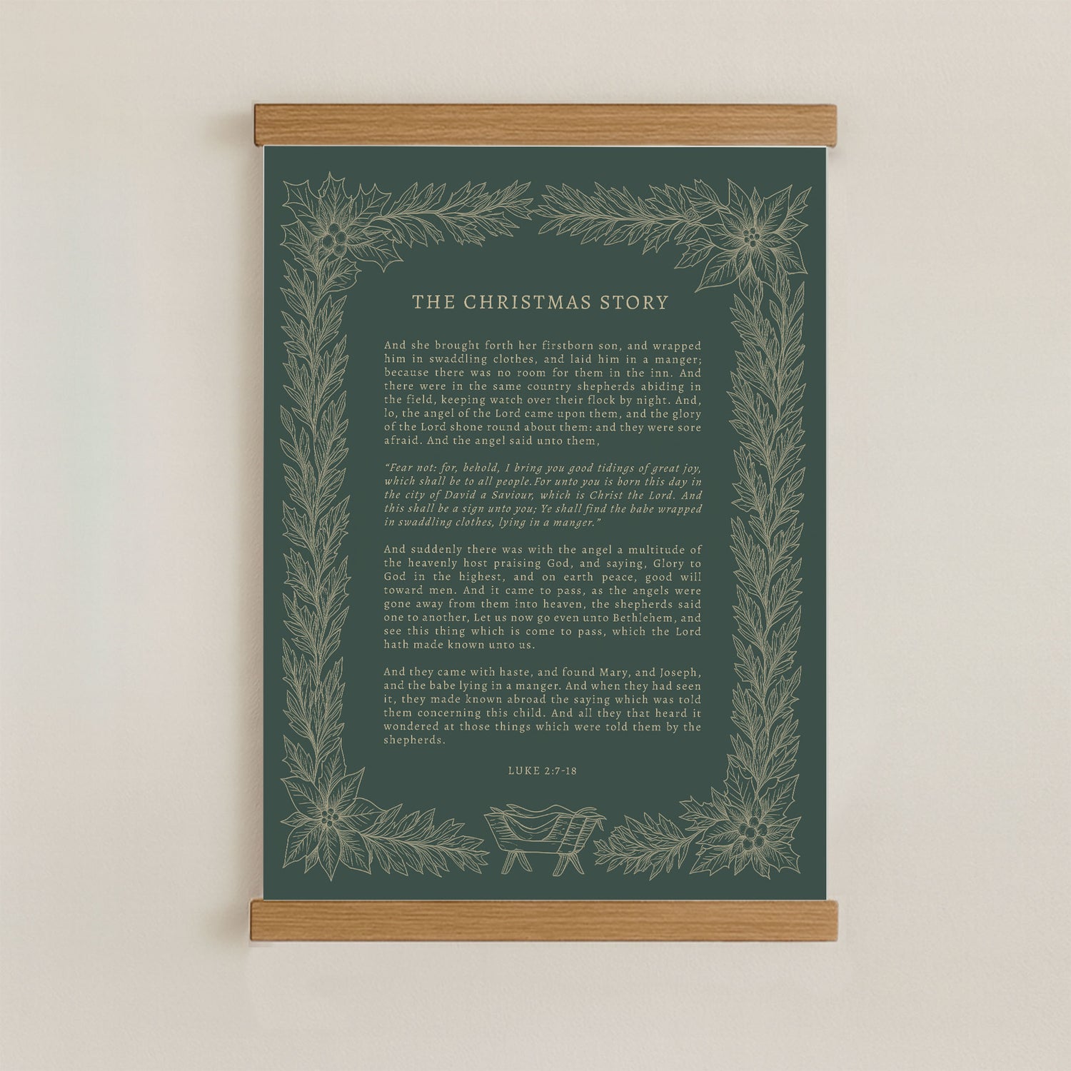 The image is a framed print of a Christmas-themed text, with a dark green background and a decorative border of leaves and flowers.