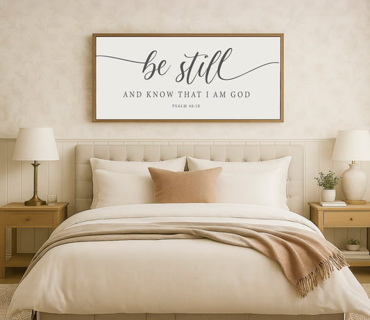 a bedroom with a bed, nightstands, and a picture on the wall