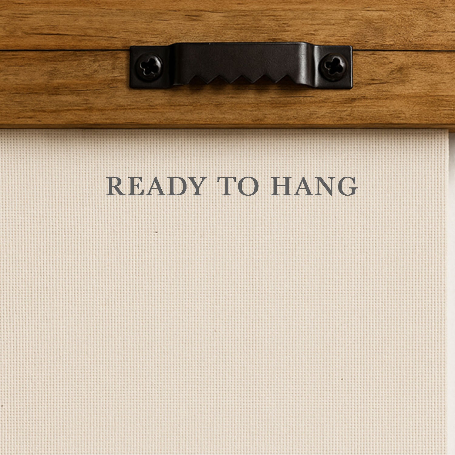 a wooden frame with a black metal bracket and a piece of paper with the text "READY TO HANG" printed on it.