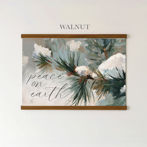 The image is a framed painting depicting a branch of pine trees with snow on it, and the text 