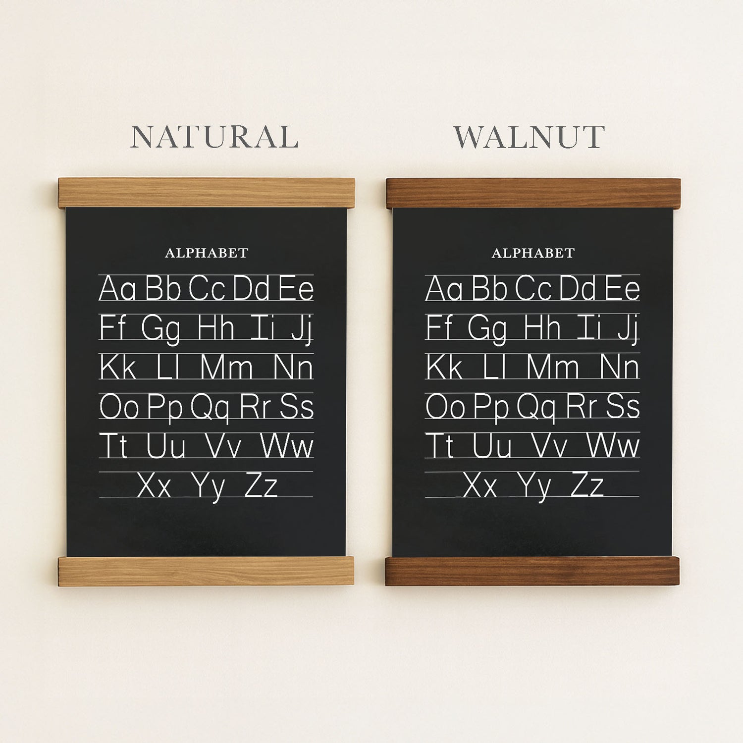 two chalkboard-style alphabet posters, each with a different color frame. The posters are labeled "NATURAL" and "WALNUT" above them, indicating the color of the frame. The posters contain the alphabet written in a chalkboard style, with each letter followed by a corresponding line of text.