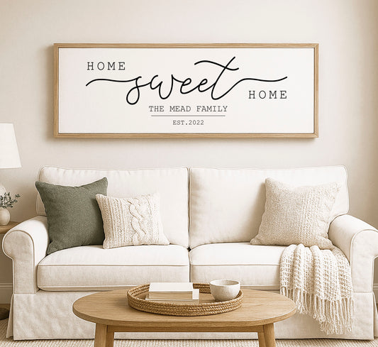 a living room with a white couch and a coffee table