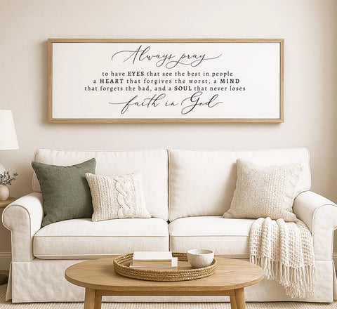a living room with a white couch and a coffee table