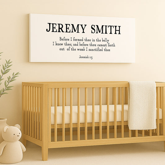 a baby crib with a teddy bear next to it