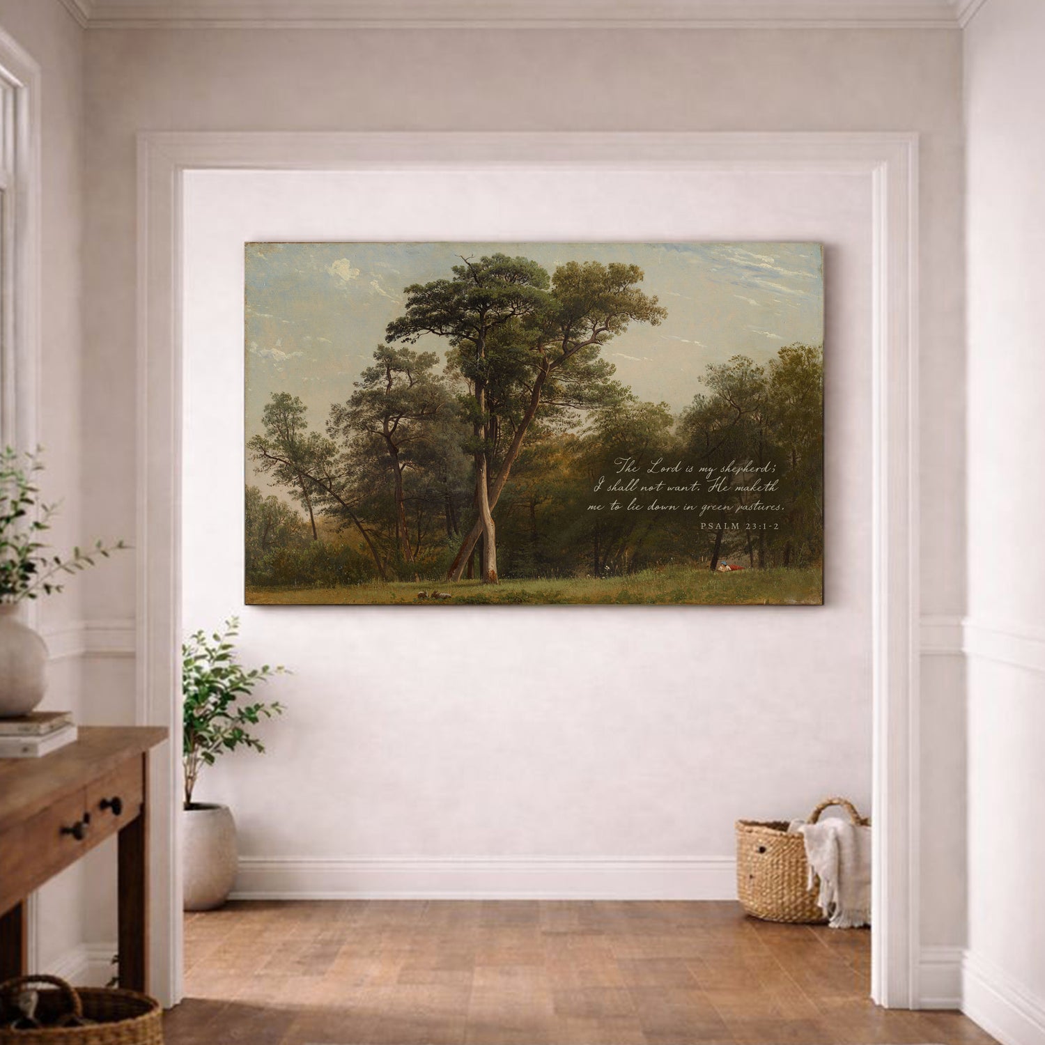 a large painting of a serene landscape with a forest in the background, hanging on a white wall in a room with a wooden floor.