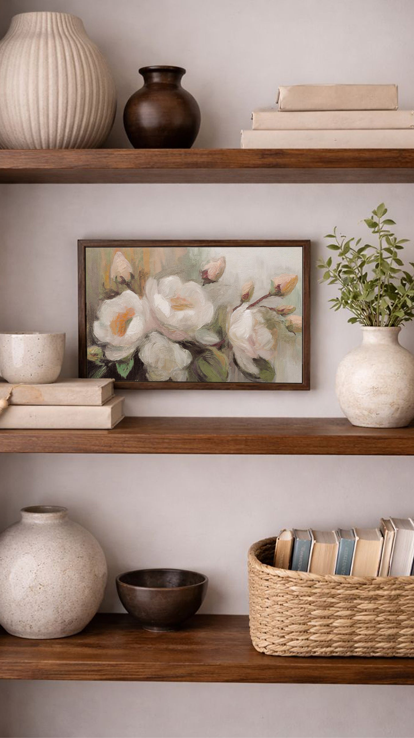 a well-organized bookshelf with various decorative items and books arranged neatly on the shelves.