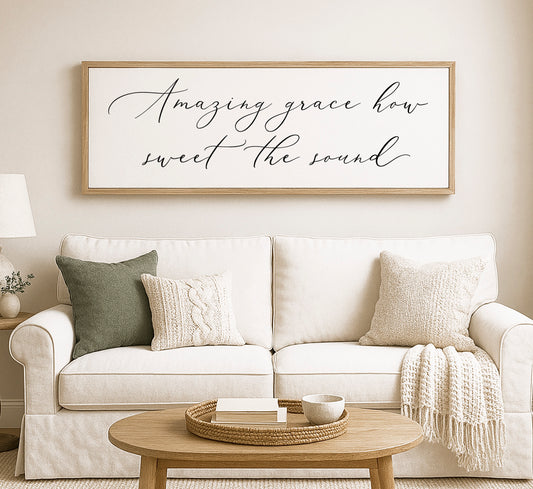 a living room with a white couch and a coffee table