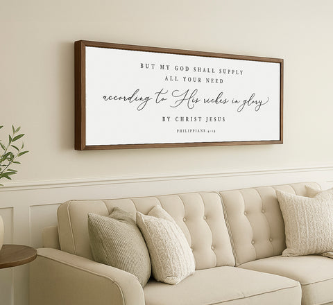 a living room with a couch and a framed picture