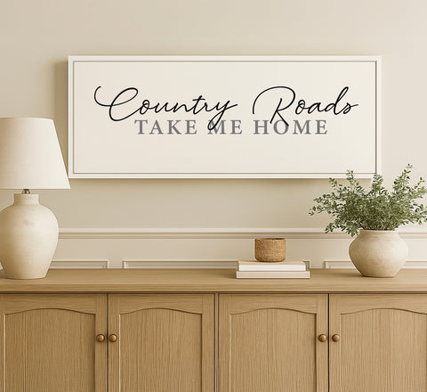 a picture of a country road take me home sign