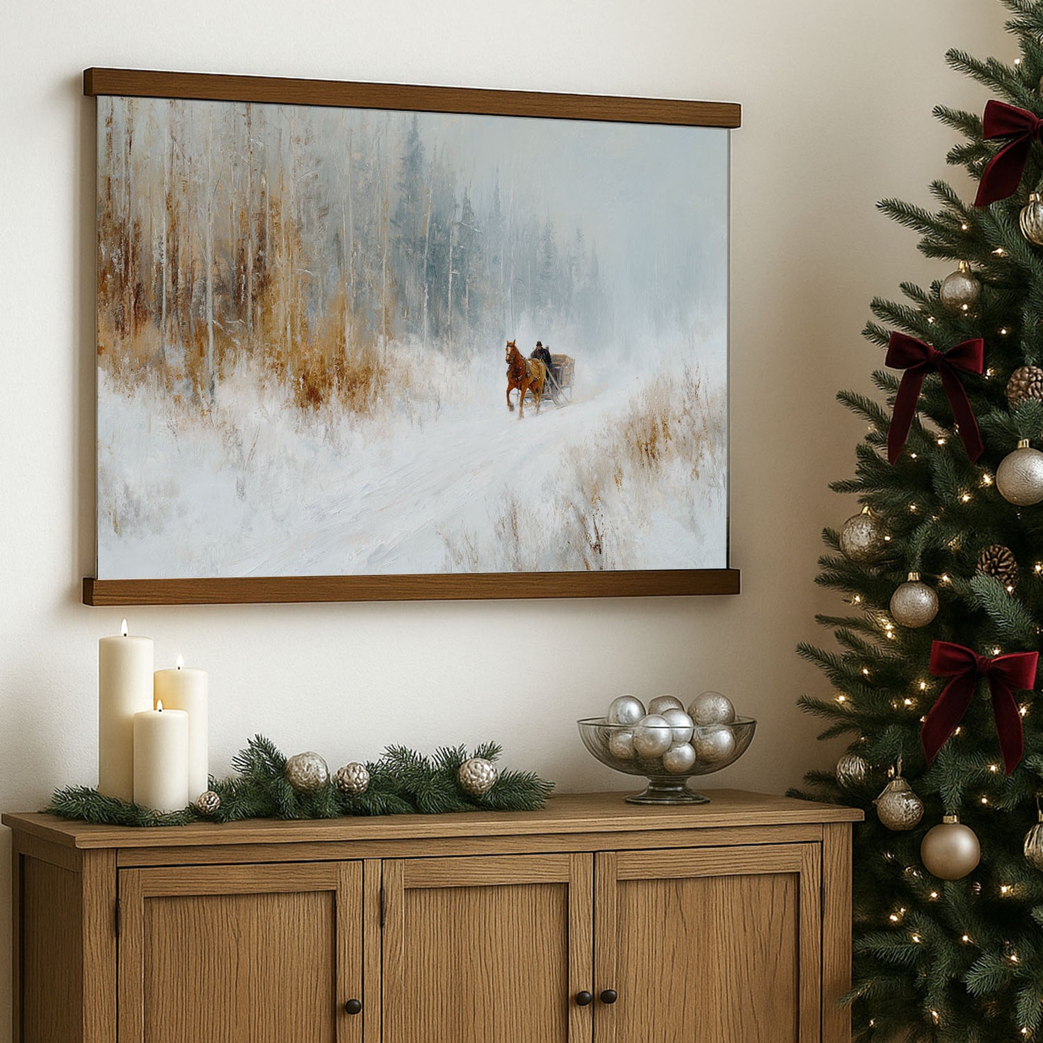 a cozy Christmas scene with a framed painting of a horse-drawn sleigh on a snowy path, a wooden cabinet with a bowl of silver ornaments, and a decorated Christmas tree with red bows.
