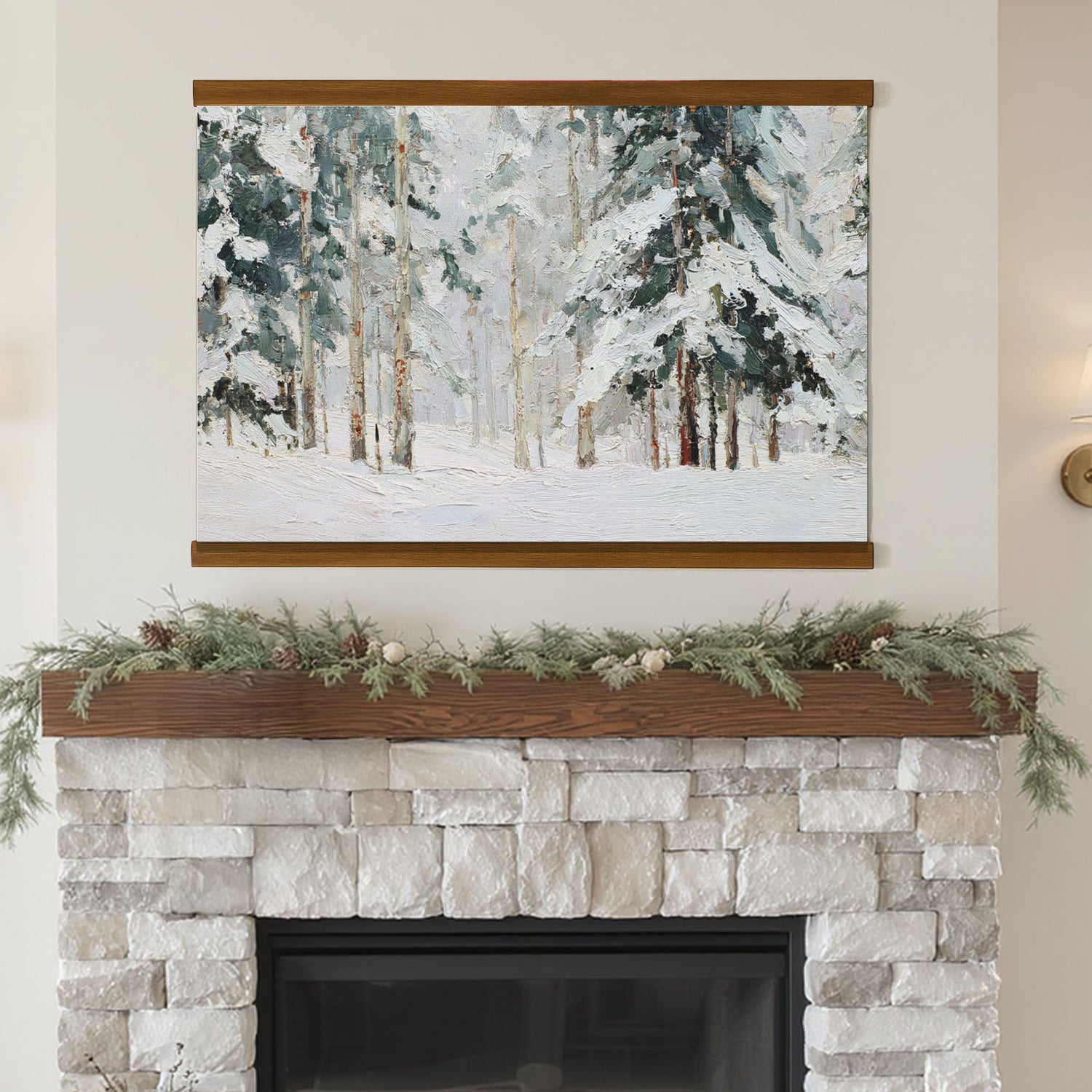 a fireplace with a painting of a snowy forest hanging above it. The painting is framed and mounted on the wall above the fireplace.
