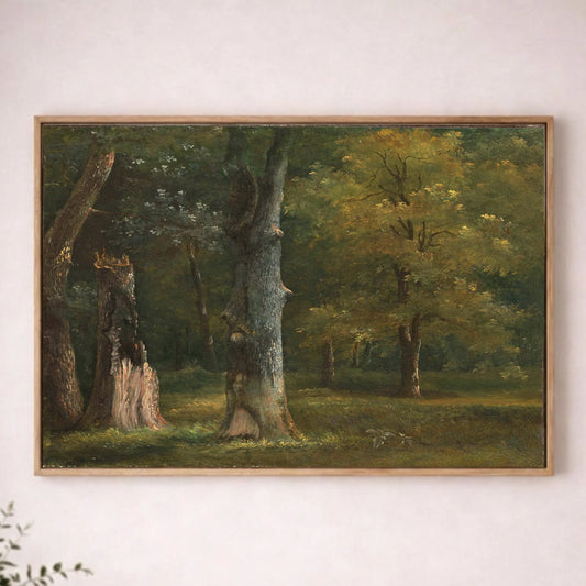 a painting of a forest scene hanging on a white wall.