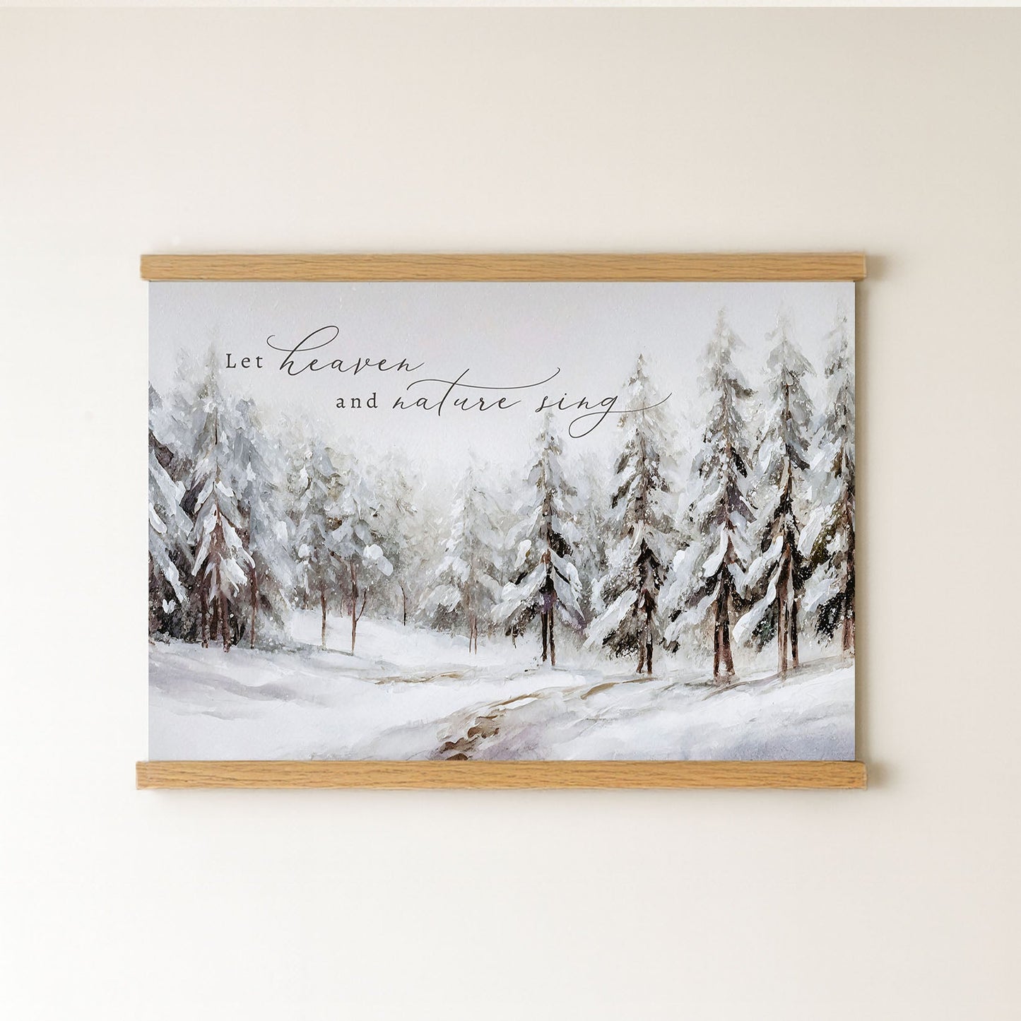 A framed painting depicting a snowy forest landscape with pine trees covered in snow.
