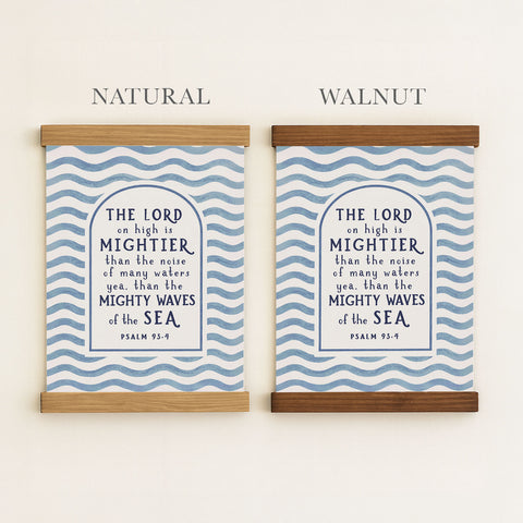 two framed prints with the same design, featuring a blue and white wave pattern. The text on the prints reads 