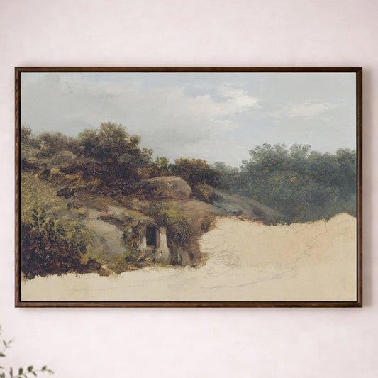 a painting of a landscape with a beach and trees hanging on a wall above a wooden table with a plant on it.