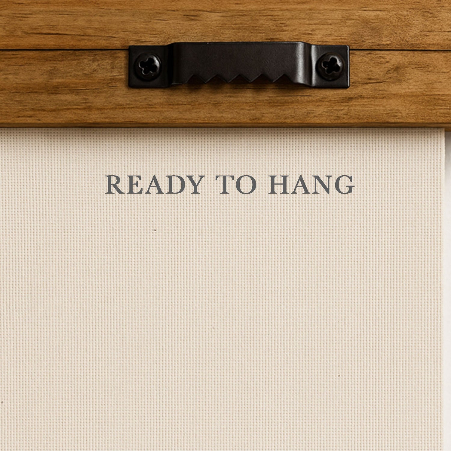 a wooden frame with a black metal bracket and a piece of paper with the text "READY TO HANG" printed on it.