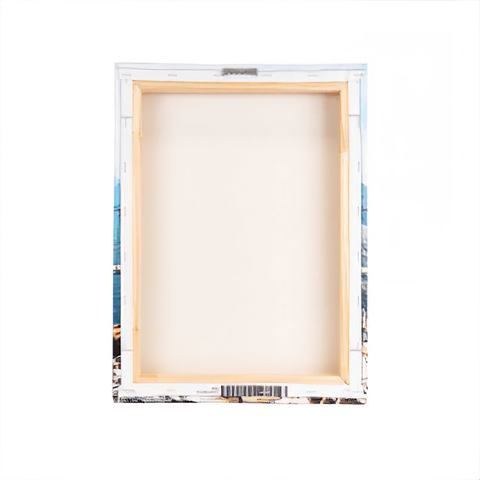 an empty picture frame with a cityscape in the background