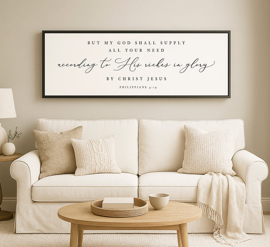 a living room with a white couch and a coffee table