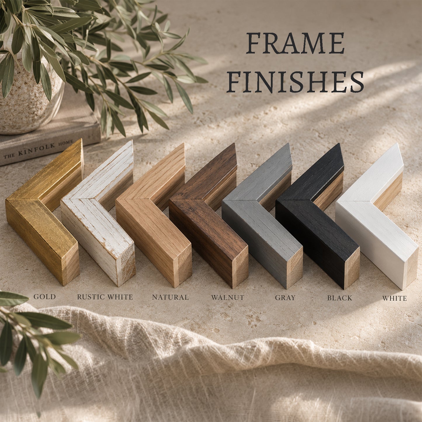 a collection of various wooden frame finishes, including gold, rustic white, natural, walnut, gray, black, and white, arranged in a row on a beige surface.