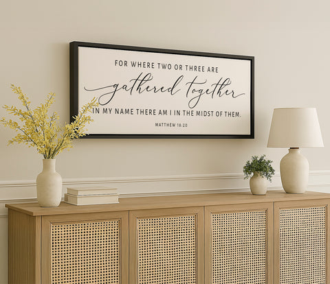 a picture hanging on a wall above a dresser