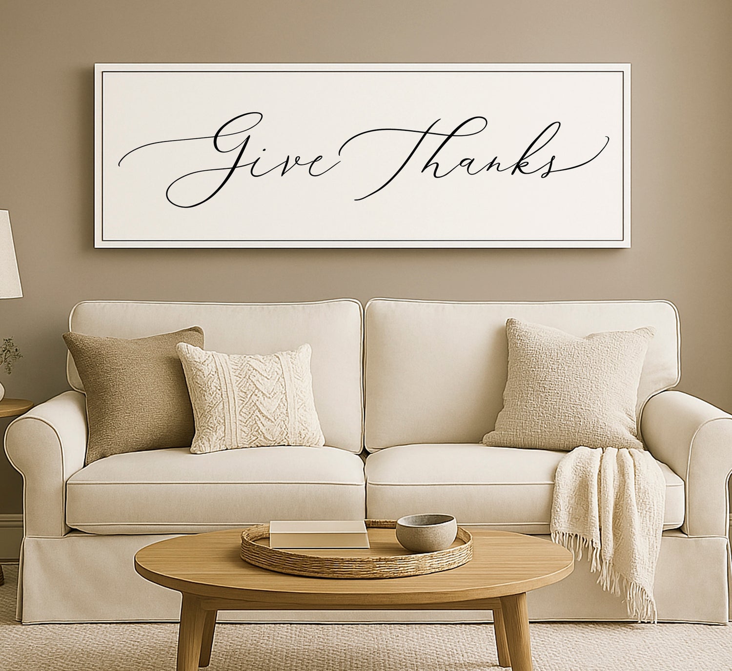a living room with a white couch and a coffee table