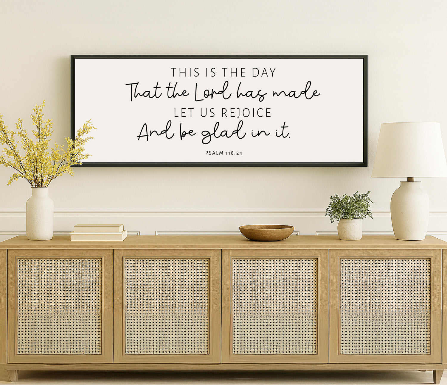a picture of a quote on a wall above a cabinet