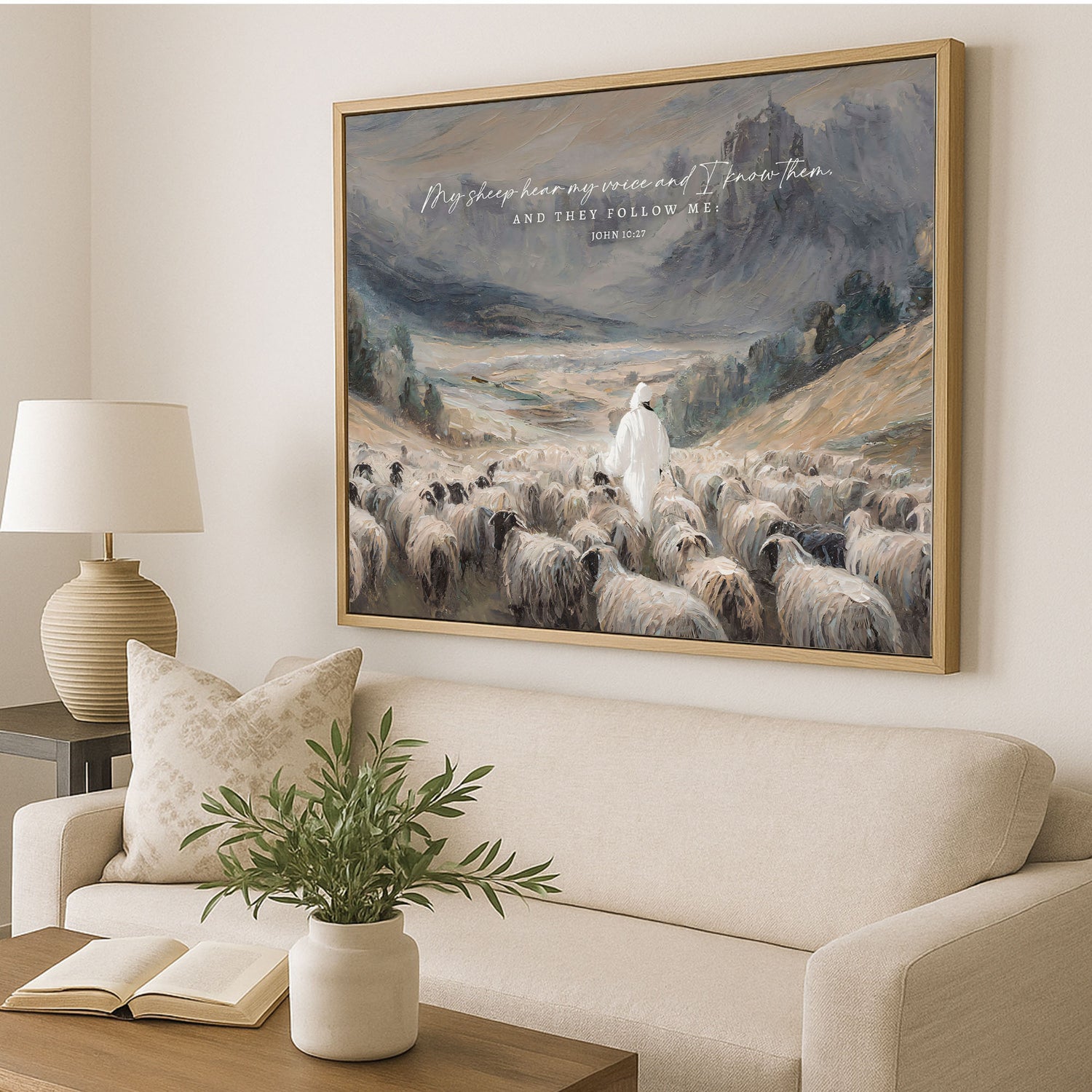 a large painting of a shepherd leading a flock of sheep in a pastoral landscape, with a quote from the Bible above the painting.