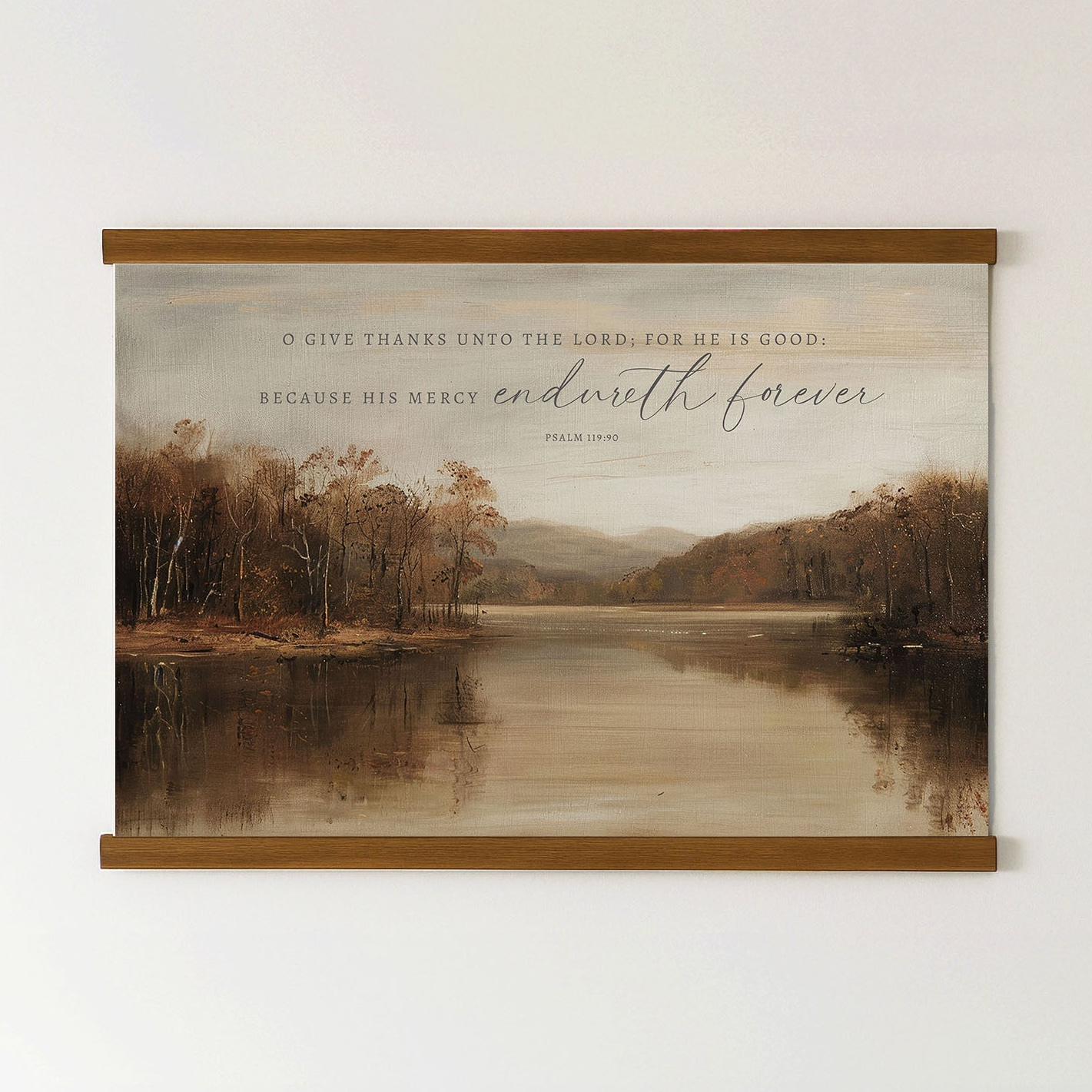The image is a framed print of a serene landscape featuring a lake surrounded by trees and mountains. The text on the print reads, "O give thanks unto the Lord, for he is good. Because his Mercy endures forever. Psalm 18:1-3".