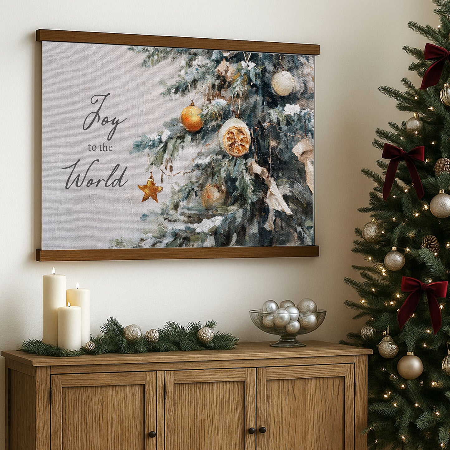 a Christmas tree decorated with ornaments, a bowl of silver balls, and a framed painting of a Christmas tree with ornaments. The painting has the text "Joy to the World" written on it.