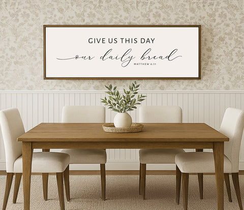 a dining room table with a vase of flowers on it